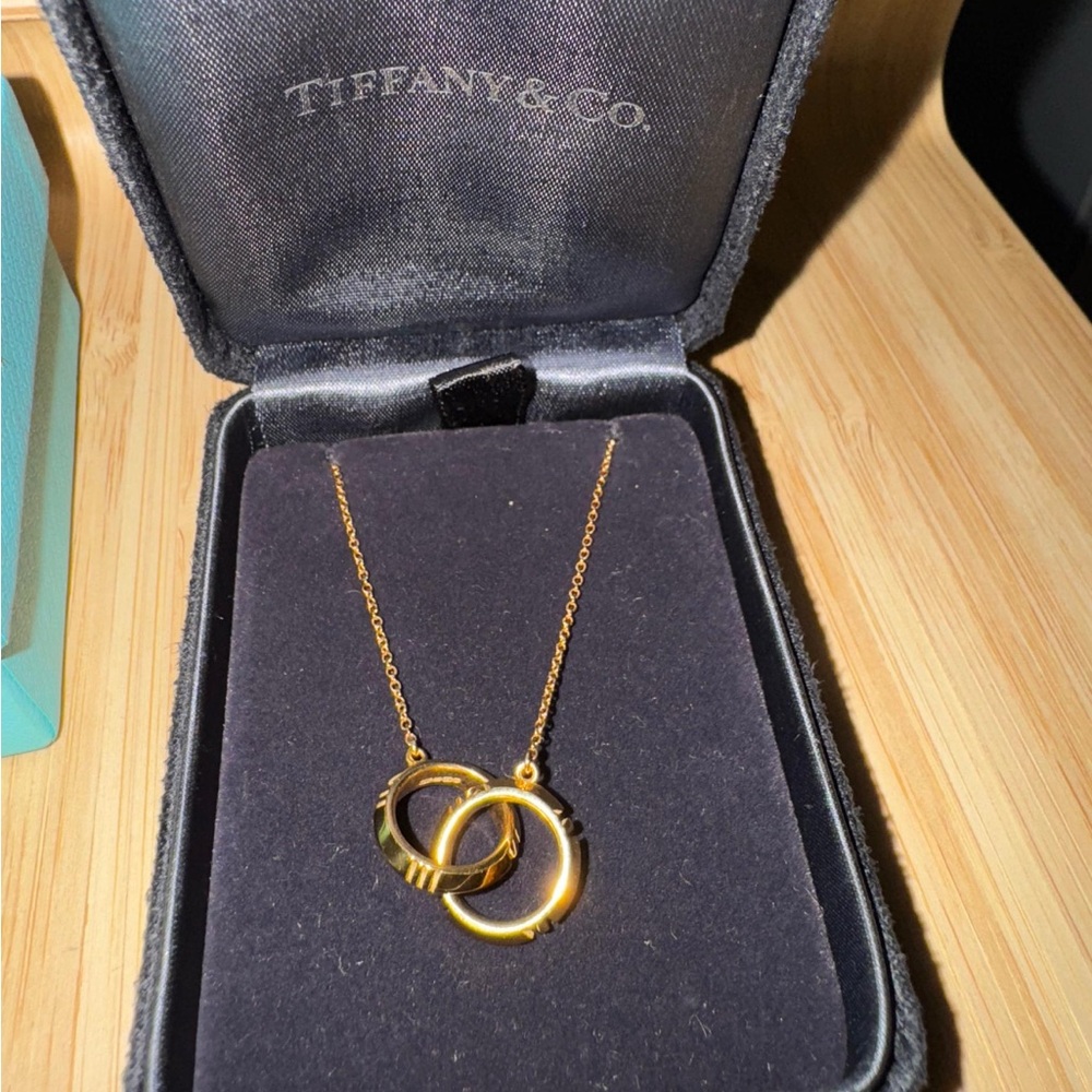 Tiffany & Co. Atlas X Closed Interlocking Pendant Necklace 18K Yellow Gold